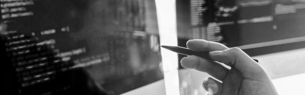 Hand pointing to NTFS permissions on computer screen.